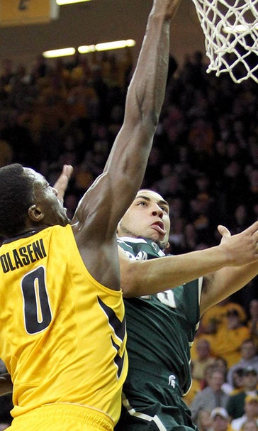 No. 7 Michigan State holds off No. 15 Iowa in OT